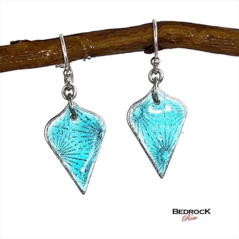 Bedrock Rose teal sunburst enamel dangle earrings made from roll-printed fine silver with translucent glass finish.