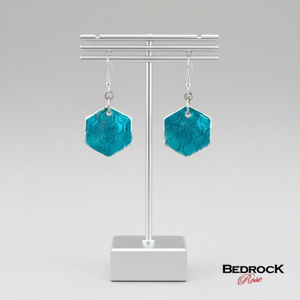 Bedrock Rose hexagon dangle earrings in fine silver with turquoise vitreous enamel and roll-printed honeycomb texture.