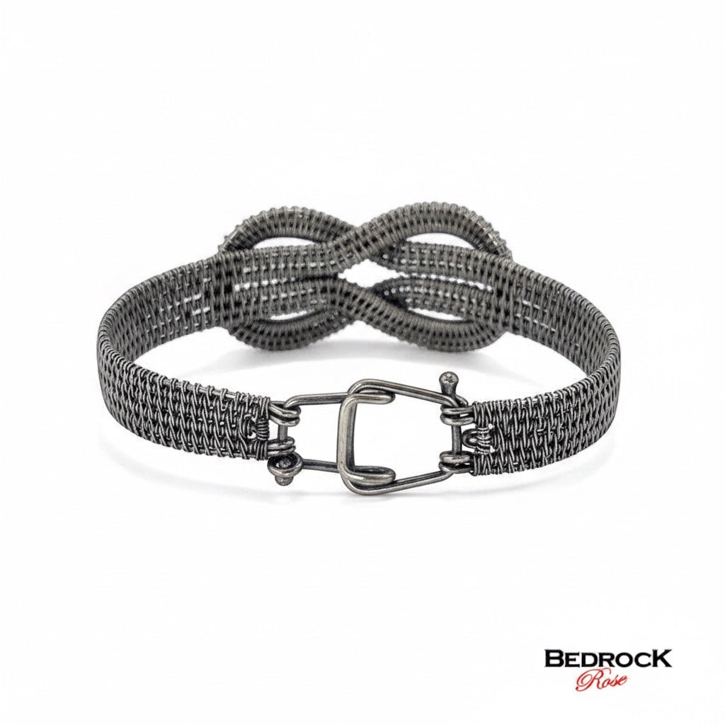 Bedrock Rose woven sterling silver infinity bracelet with a secure hook clasp, featuring an eternal love symbol.