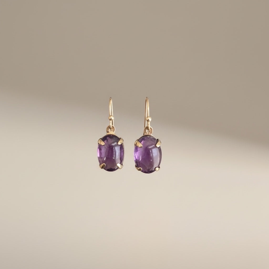 Bedrock Rose amethyst prong set oval drop earrings in gold.