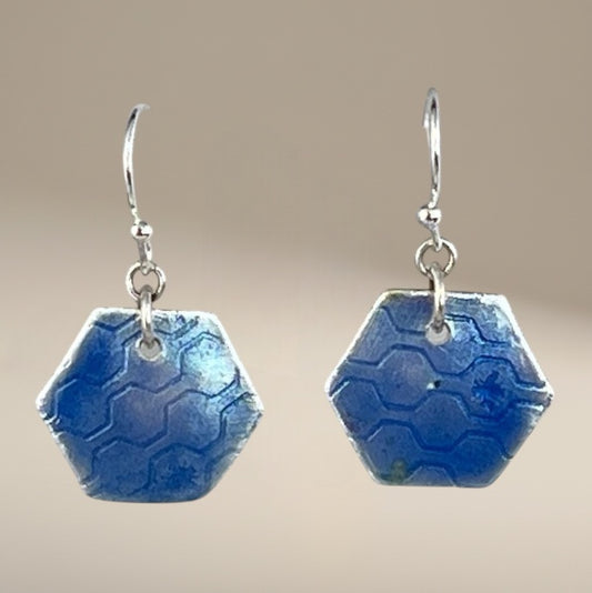 Periwinkle hexagon earrings, contemporary fashion earrings, stylish accessories, captivating color accents, trendy geometric designs, modern and chic fashion, handmade jewelry