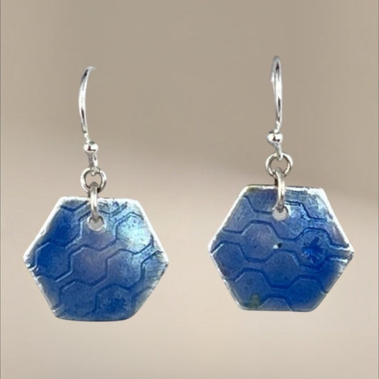 Periwinkle hexagon earrings, contemporary fashion earrings, stylish accessories, captivating color accents, trendy geometric designs, modern and chic fashion, handmade jewelry