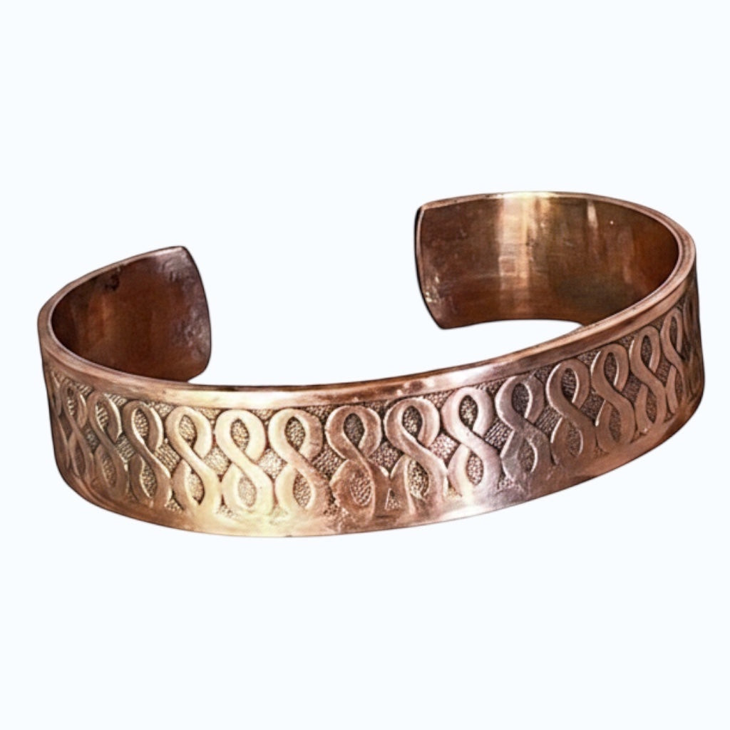 Bedrock Rose copper cuff bracelet with an ombre infinity pattern, antiqued finish, and high shine details.