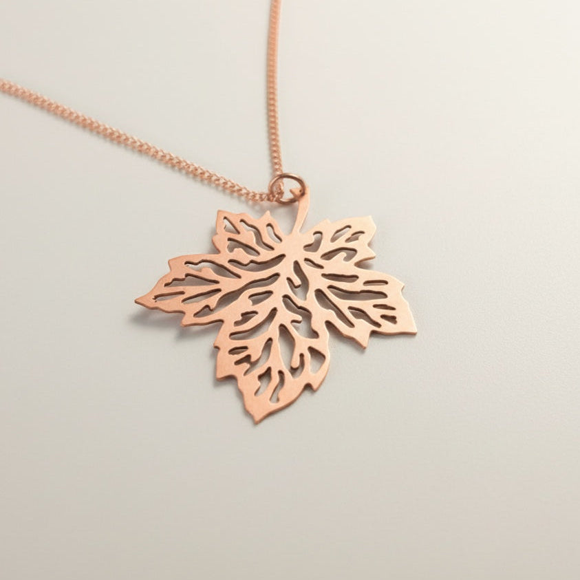 Bedrock Rose hand-pierced copper maple leaf necklace with an 18" chain. Vintage style, perfect for Autumn.