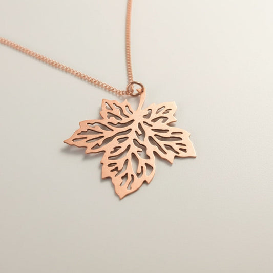 Bedrock Rose hand-pierced copper maple leaf necklace with an 18" chain. Vintage style, perfect for Autumn.