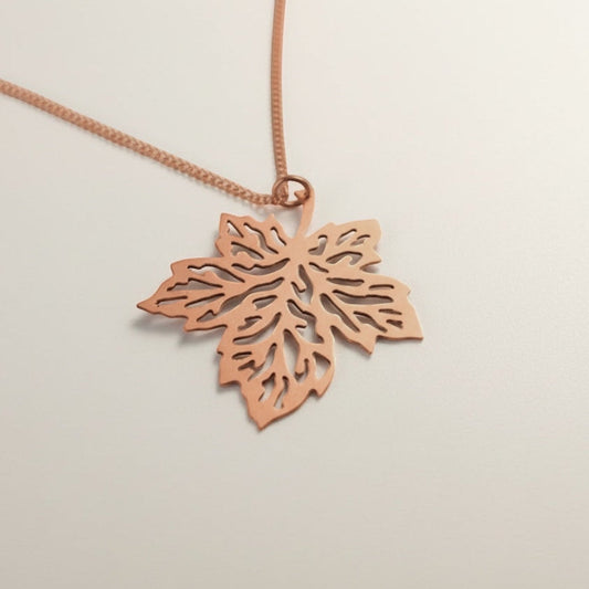Bedrock Rose hand-pierced copper maple leaf necklace with an 18" chain. Vintage style, perfect for Autumn.