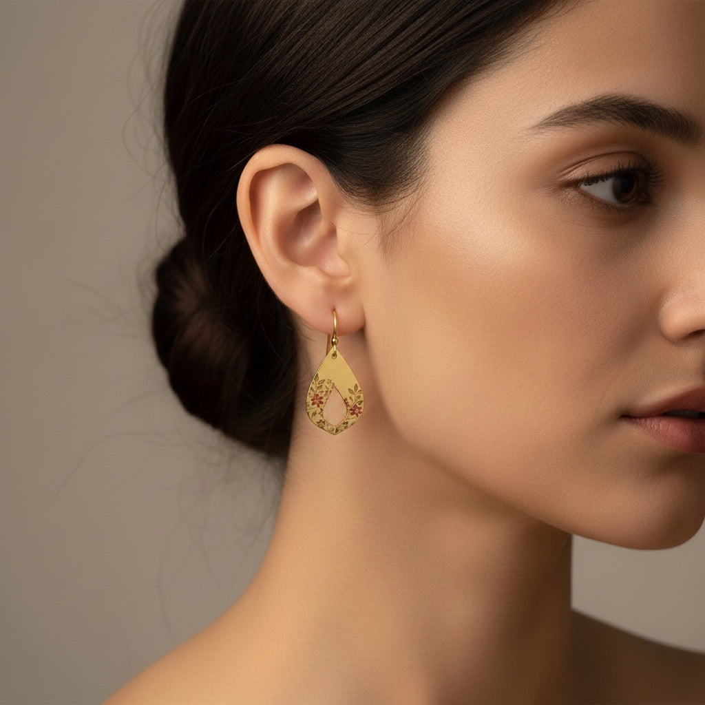 Bedrock Rose gold-plated teardrop earrings with hand-painted crimson floral details and open floral vine etching.