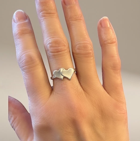 Bedrock Rose sterling silver bypass ring with two overlapping hearts, size 7.5.