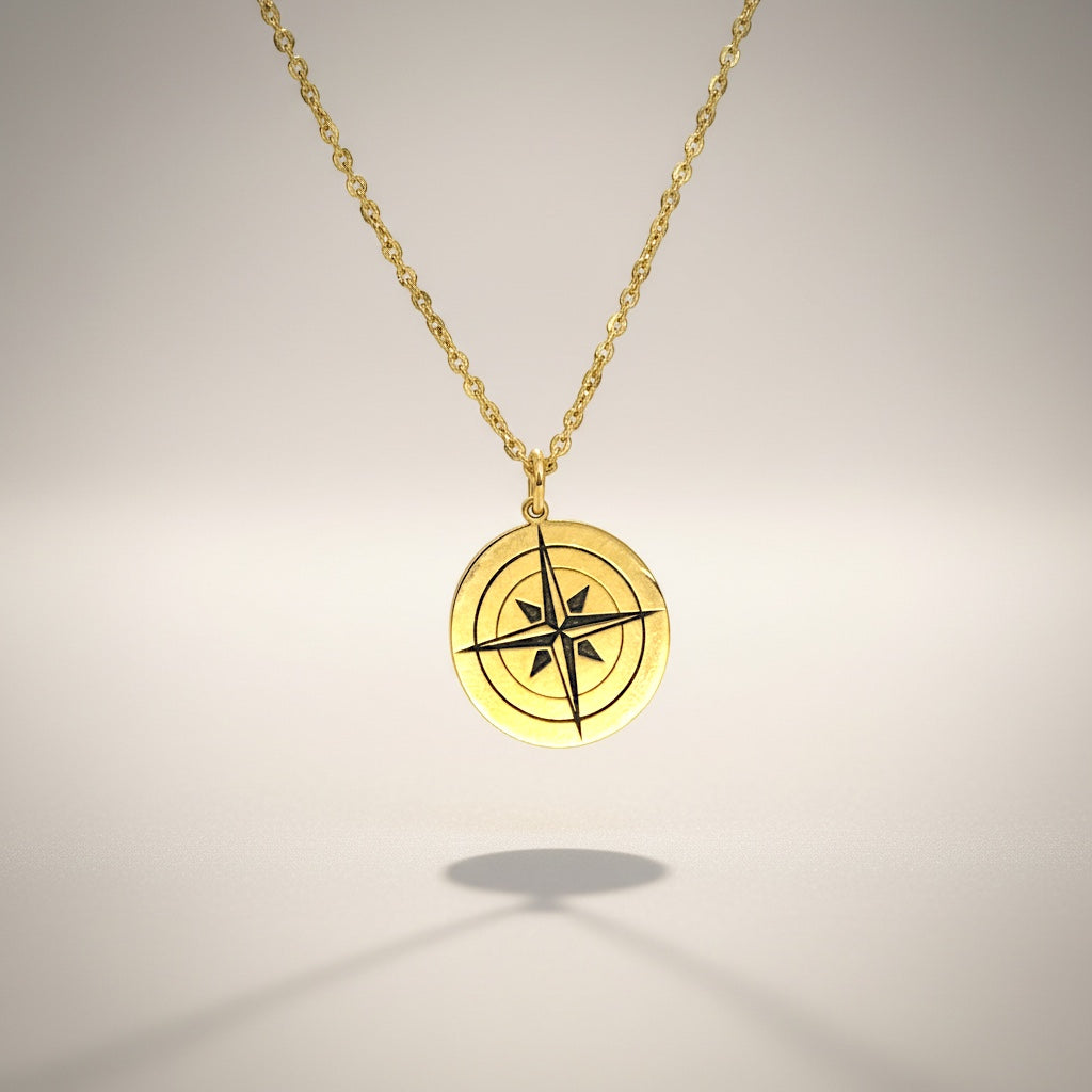 Bedrock Rose gold compass rose necklace on a faceted chain. Symbol of purpose and self-discovery.