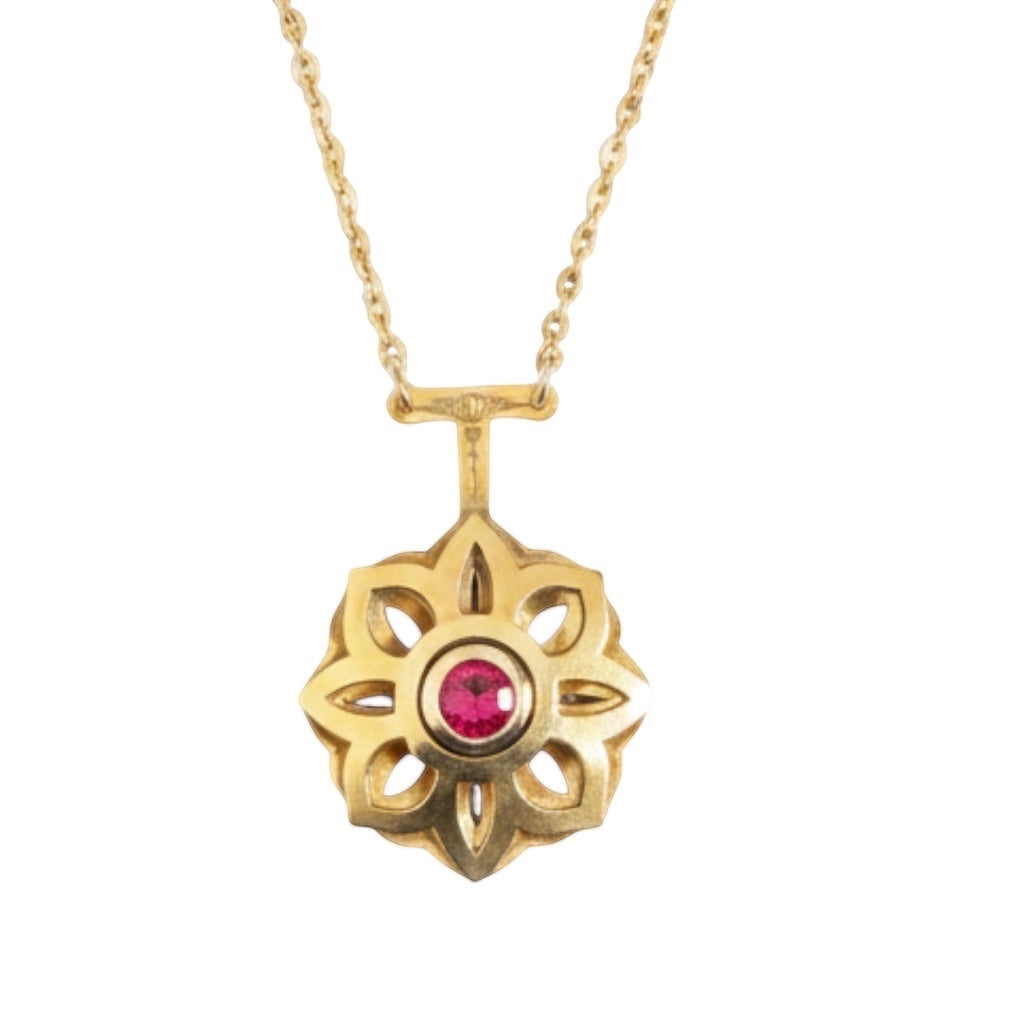 Bedrock Rose gold Art Deco floral pendant necklace with a central ruby. Intricate design, timeless elegance.