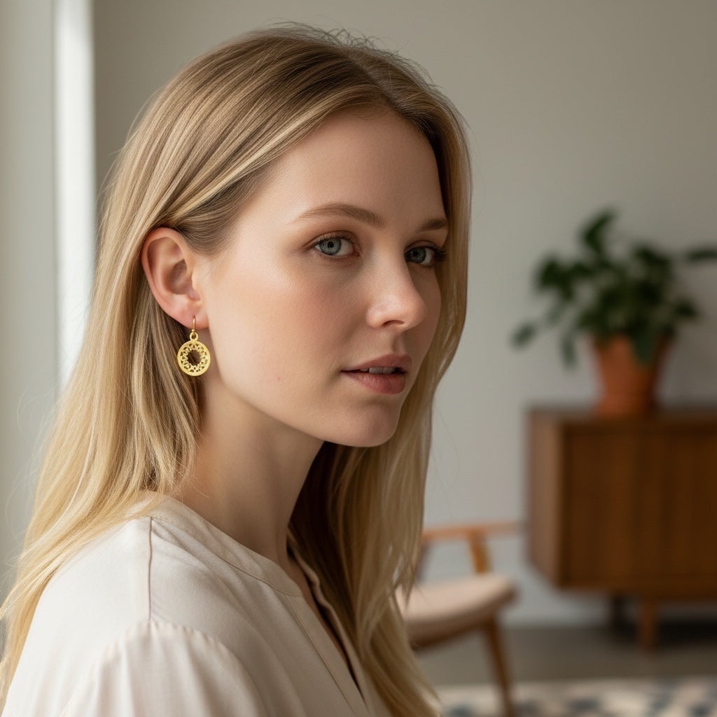 Bedrock Rose gold-plated brass open mandala disc earrings with geometric sunburst pattern, 18 mm.