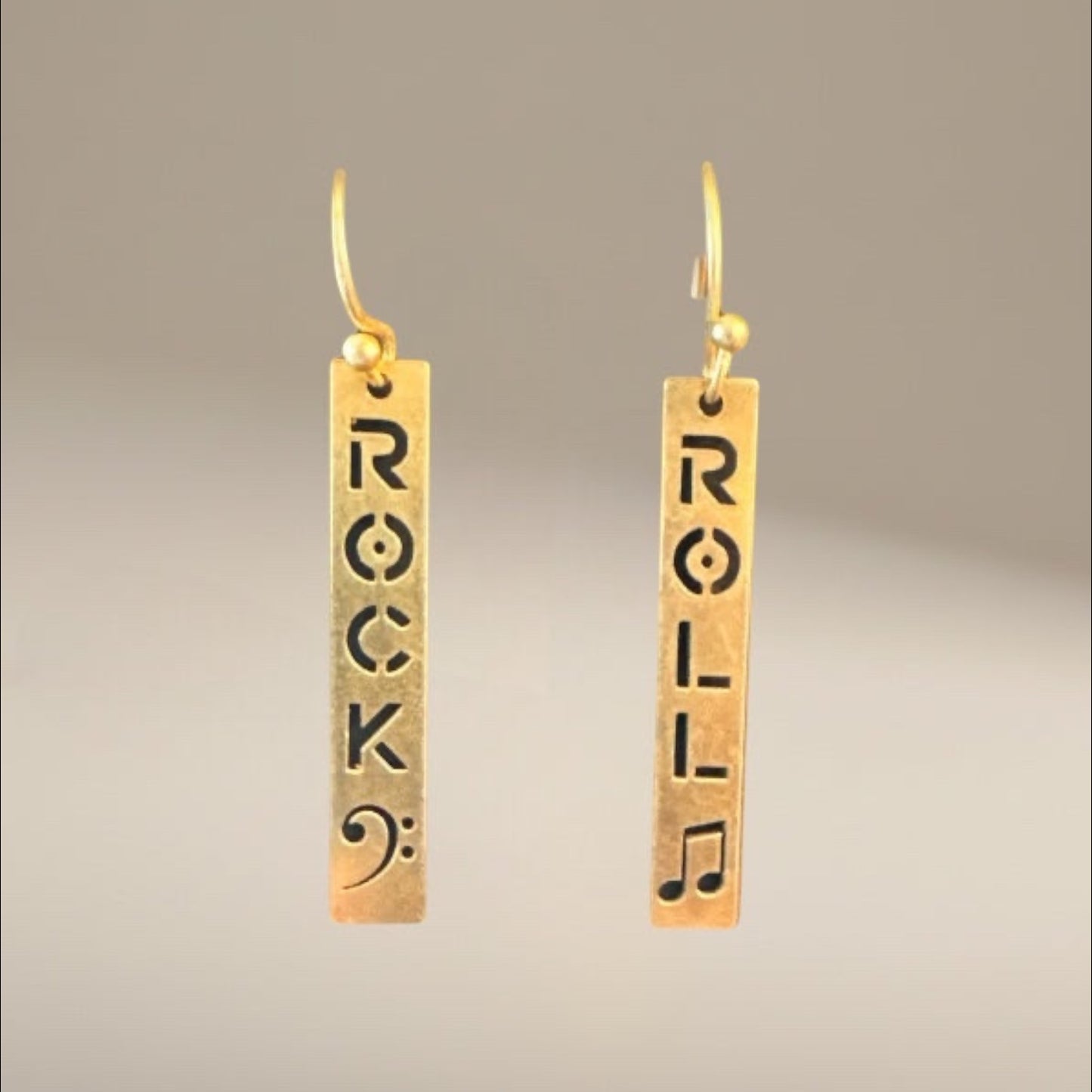Bedrock Rose gold plated dangling earrings with laser cut