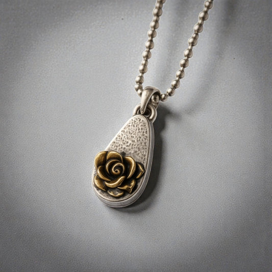 Bedrock Rose hybrid tea rose pendant with 24K gold plating on fine silver, teardrop shape.