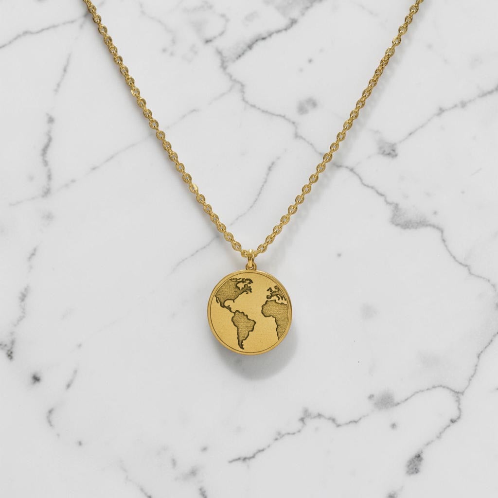 Bedrock Rose gold world necklace with intricate laser engraving on a faceted stainless steel chain. Perfect for travel lovers.