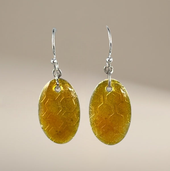 Honeycomb oval earrings, deep amber jewelry, organic honeycomb design, deep amber hues, contemporary jewelry, lightweight accessories, handcrafted jewelry, modern jewelry