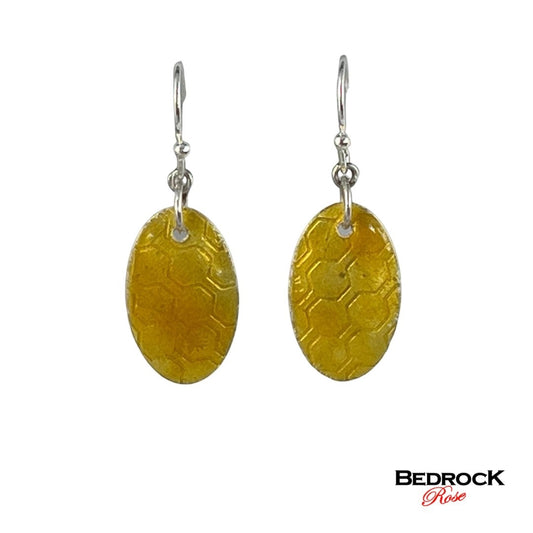 Honeycomb oval earrings, light amber jewelry, organic honeycomb design, warm amber hues, contemporary jewelry, lightweight accessories, handcrafted jewelry, modern jewelry