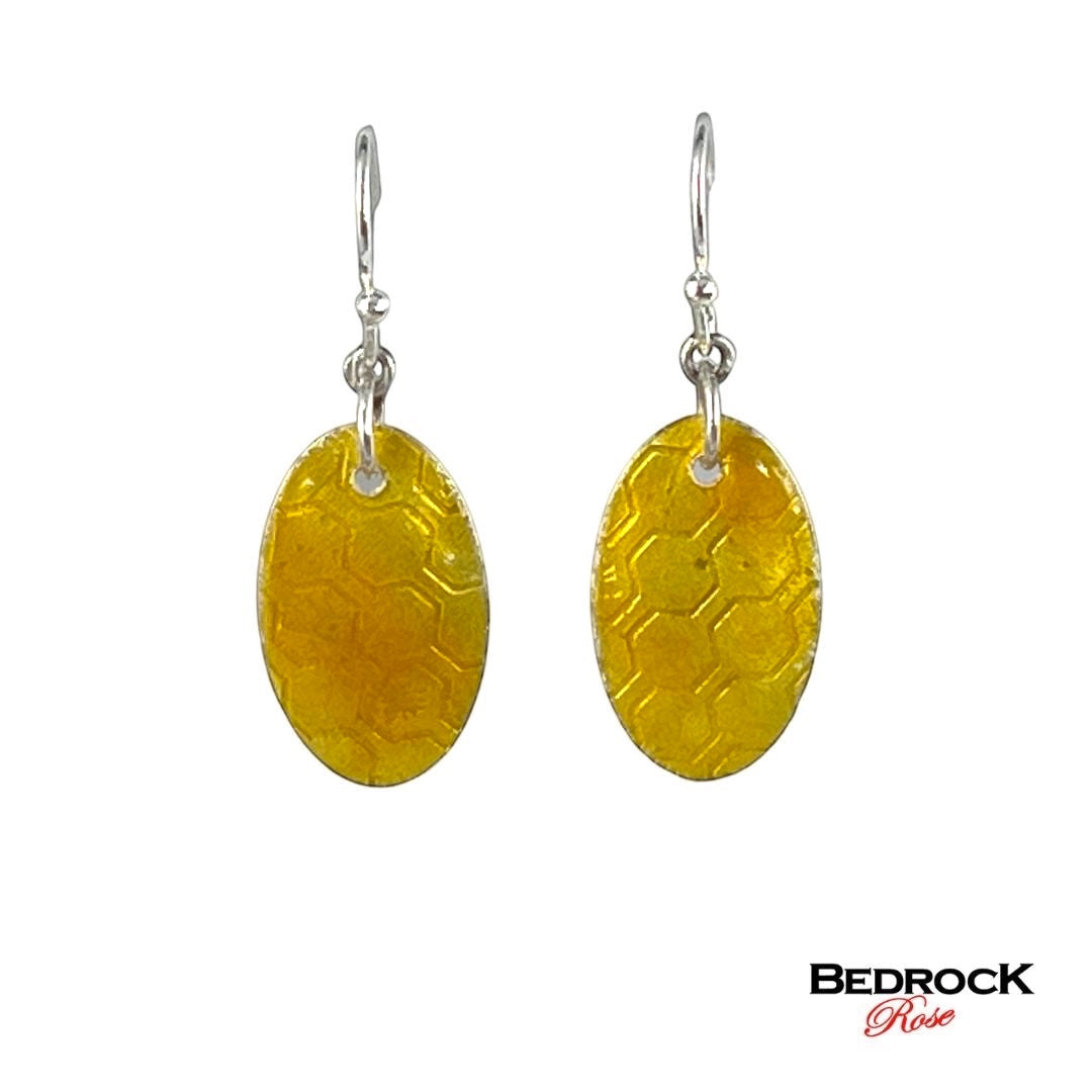 Honeycomb oval earrings, light amber jewelry, organic honeycomb design, warm amber hues, contemporary jewelry, lightweight accessories, handcrafted jewelry, modern jewelry