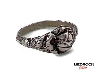 Bedrock Rose sterling silver ring featuring a detailed rose bloom and leaves. Size 9.