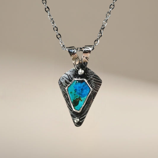 Bedrock Rose Kingman turquoise sterling silver pendant with geometric textured frame and 18" chain.