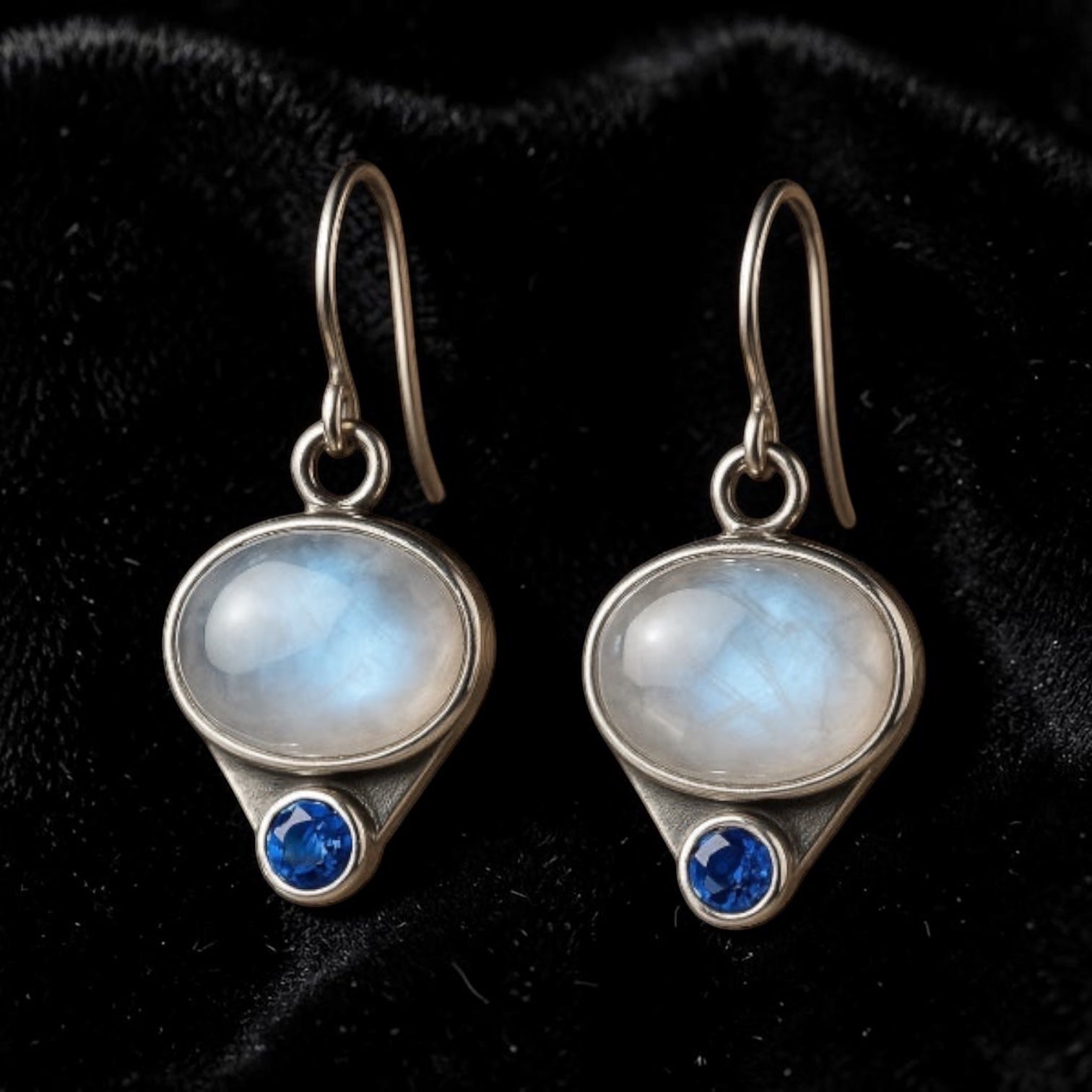 Bedrock Rose oval moonstone and blue sapphire dangle earrings in antiqued silver-tone metal.