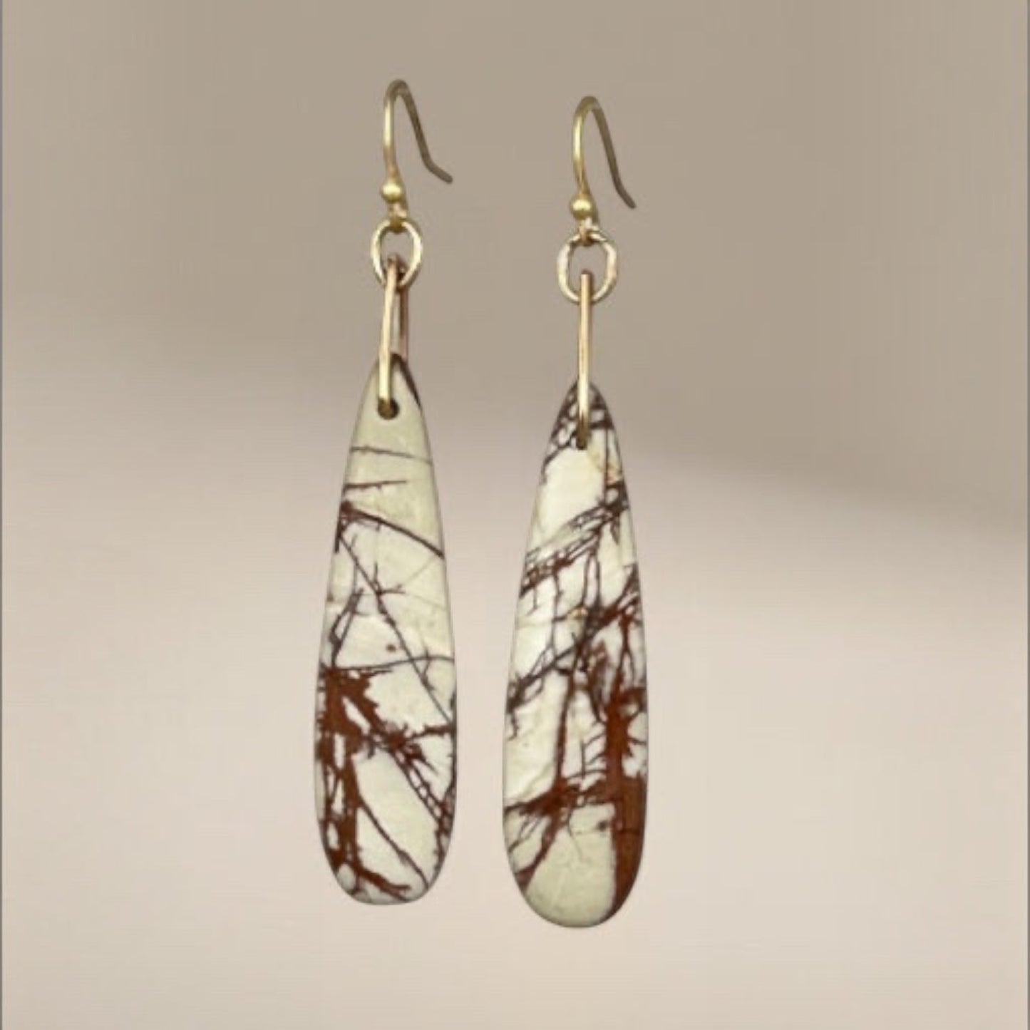 Bedrock Rose Picasso Jasper stone dangling earrings with gold-tone hooks and unique brown veining.
