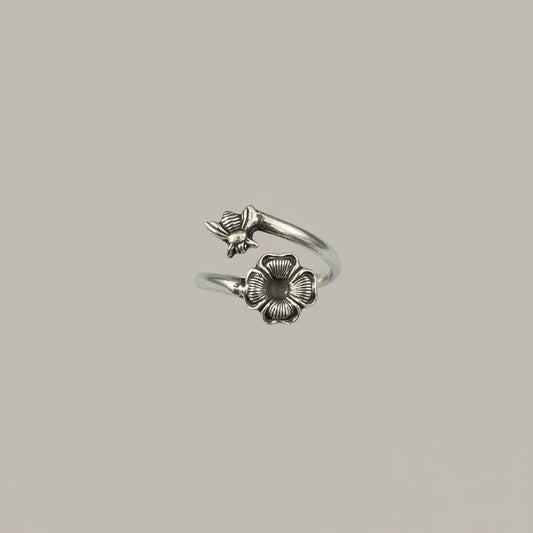 Bedrock Rose Sterling Silver Bee and Flower Wraparound Ring, adjustable summer jewelry with intricate detailing.