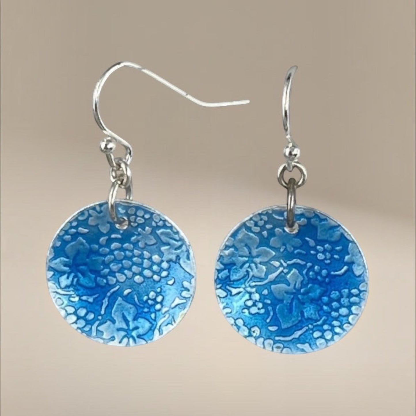 Nature-inspired accessories, whimsical fashion earrings, delicate grape design, sky blue earrings, playful grape motifs, eye-catching patterns, statement earrings, handmade jewelry