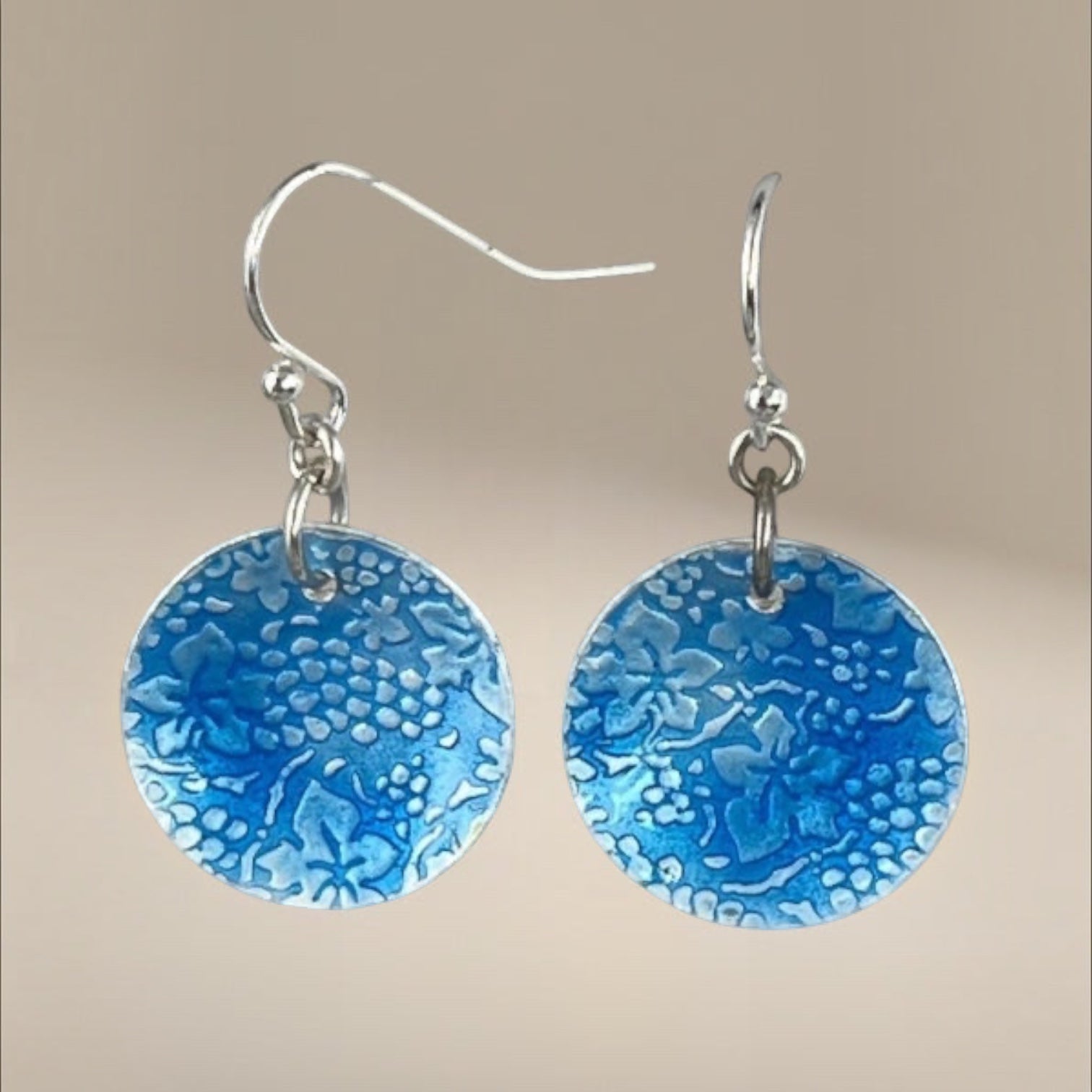 Nature-inspired accessories, whimsical fashion earrings, delicate grape design, sky blue earrings, playful grape motifs, eye-catching patterns, statement earrings, handmade jewelry