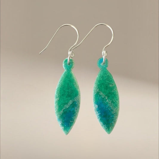 Bedrock Rose sparkly silver green dangle earrings with blue accents and surgical steel ear wires.