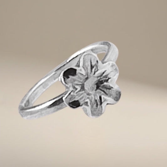 Bedrock Rose sterling silver six-petal floral ring, size 5.25. Delicate blossom design.
