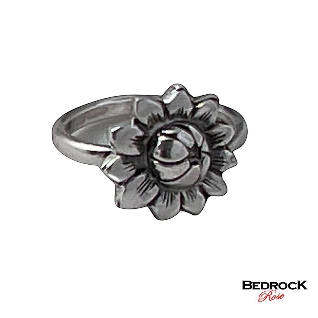 Bedrock Rose sterling silver ring featuring a detailed sunflower design. Adjustable size available.