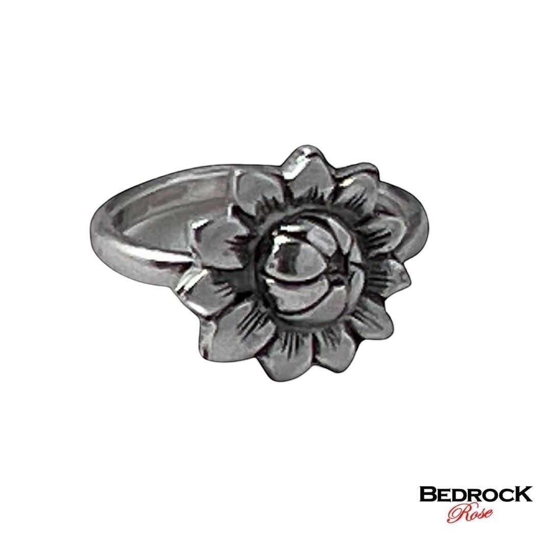 Bedrock Rose sterling silver ring featuring a detailed sunflower design. Adjustable size available.