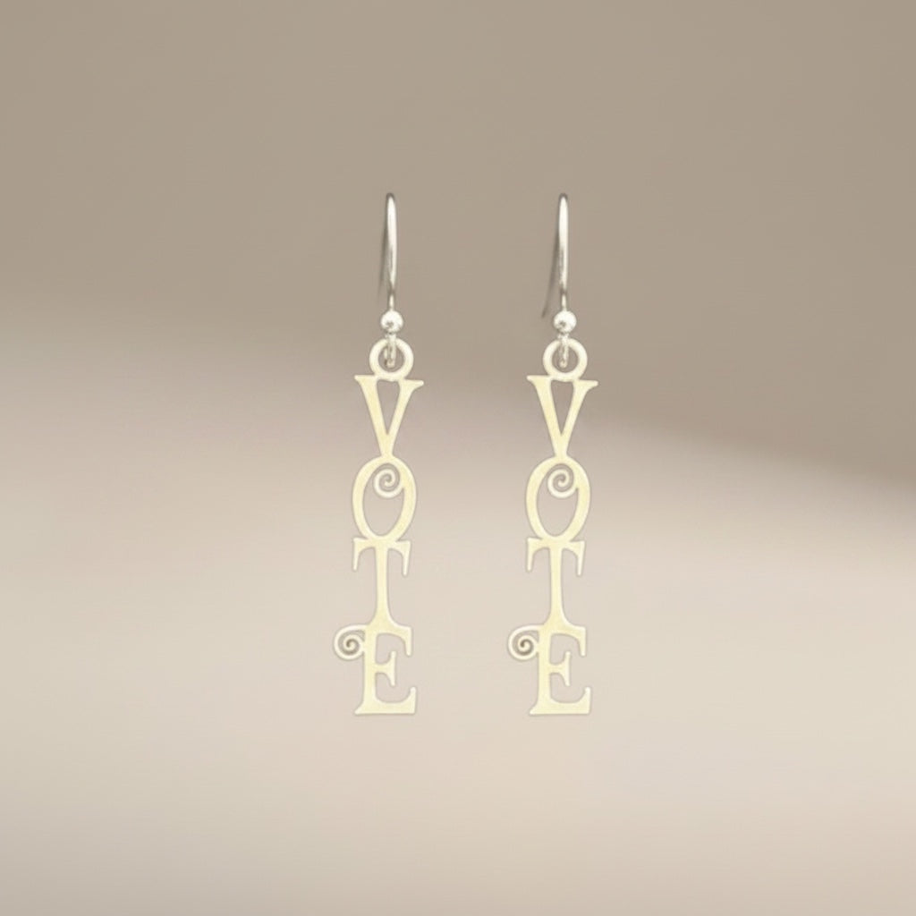 Bedrock Rose sterling silver dangling earrings with the word "Vote" in a fancy scroll font. Laser-cut design.