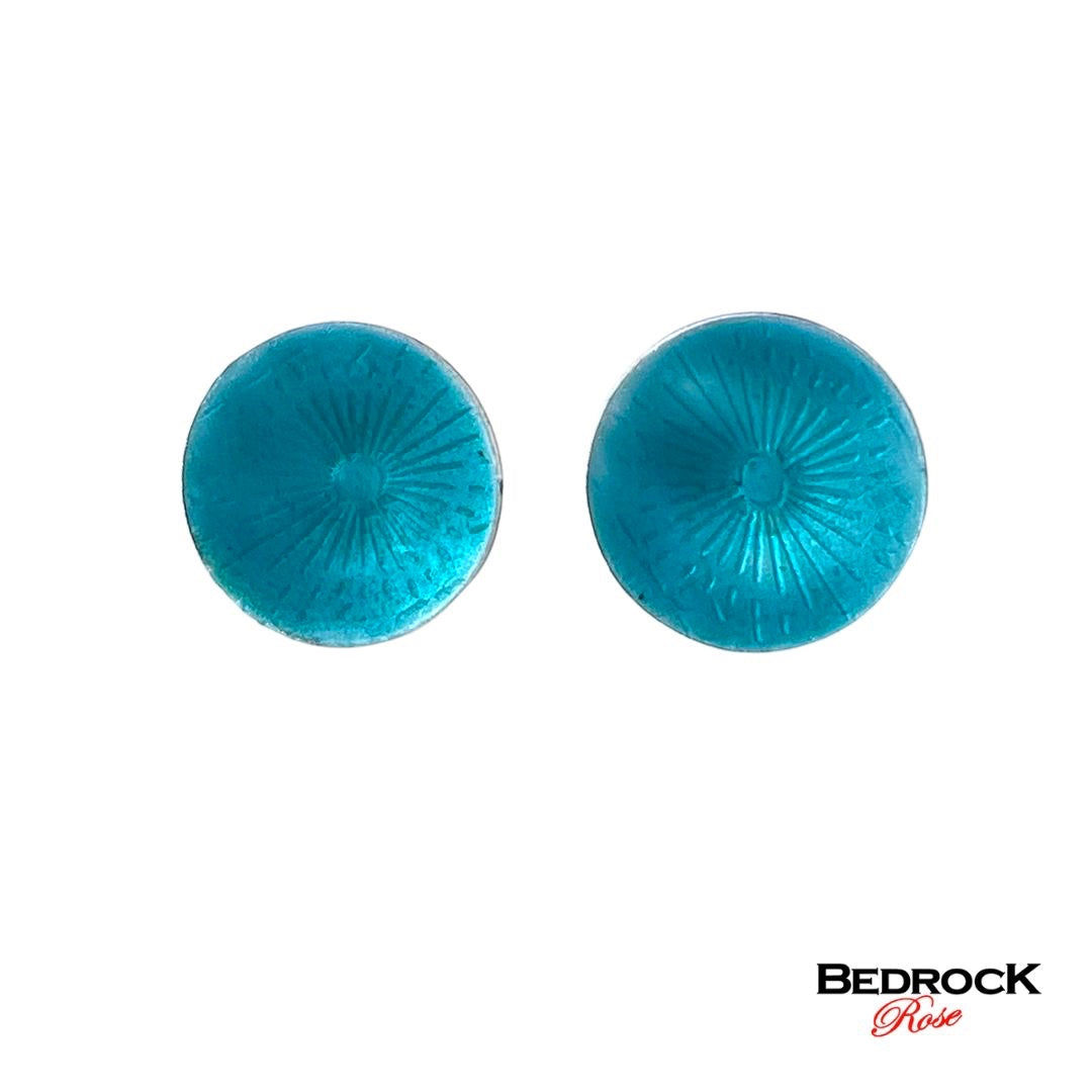 Bedrock Rose turquoise green round post earrings with transparent enamel finish and sunburst detail.
