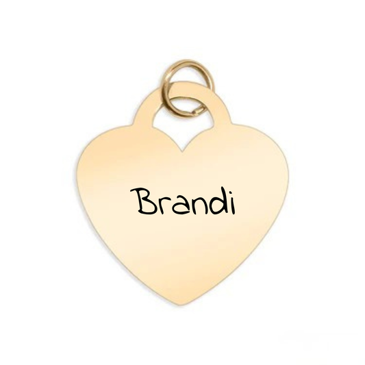 Gold heart-shaped pendant with 'Brandi' engraved on a white background