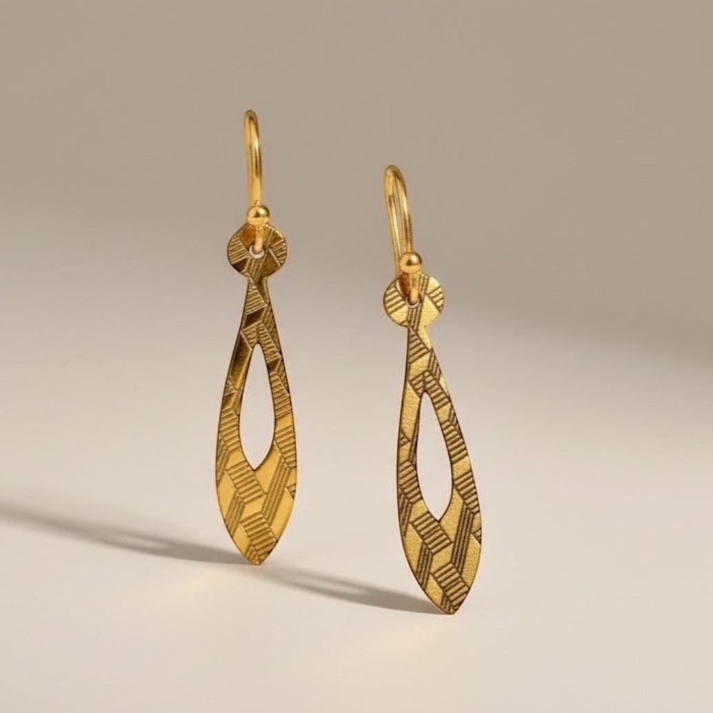 Bedrock Rose gold teardrop dangle earrings with geometric etched pattern. Modern, linear design.