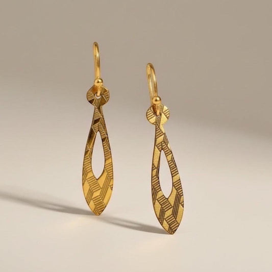 Bedrock Rose gold teardrop dangle earrings with geometric etched pattern. Modern, linear design.
