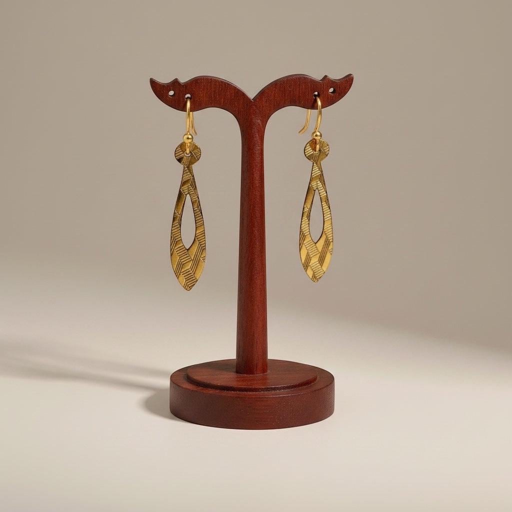 Bedrock Rose gold teardrop dangle earrings with geometric etched pattern. Modern, chic, and sophisticated.